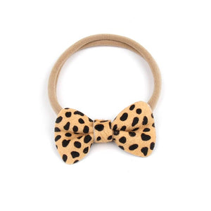 
                
                    Load image into Gallery viewer, Leather Bow Headband - Cheetah
                
            